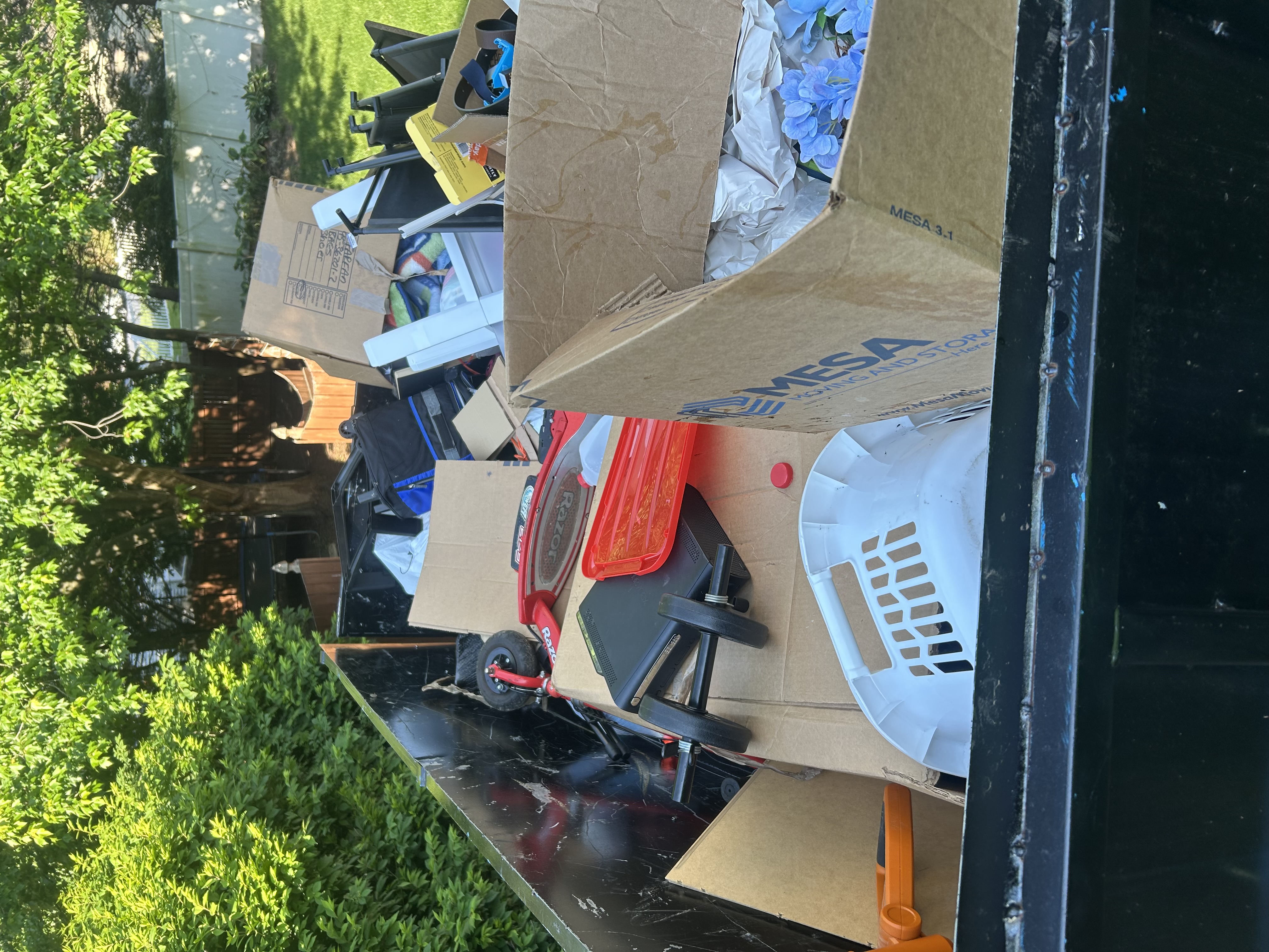 Loaded trailer at a Central PA junk removal job — load size affects pricing